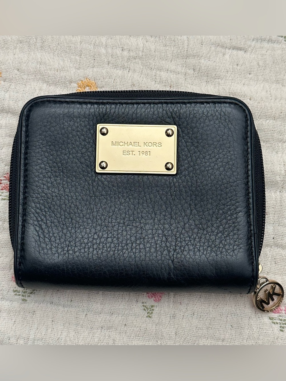 Michael Kors black pebbled leather zip-around wallet